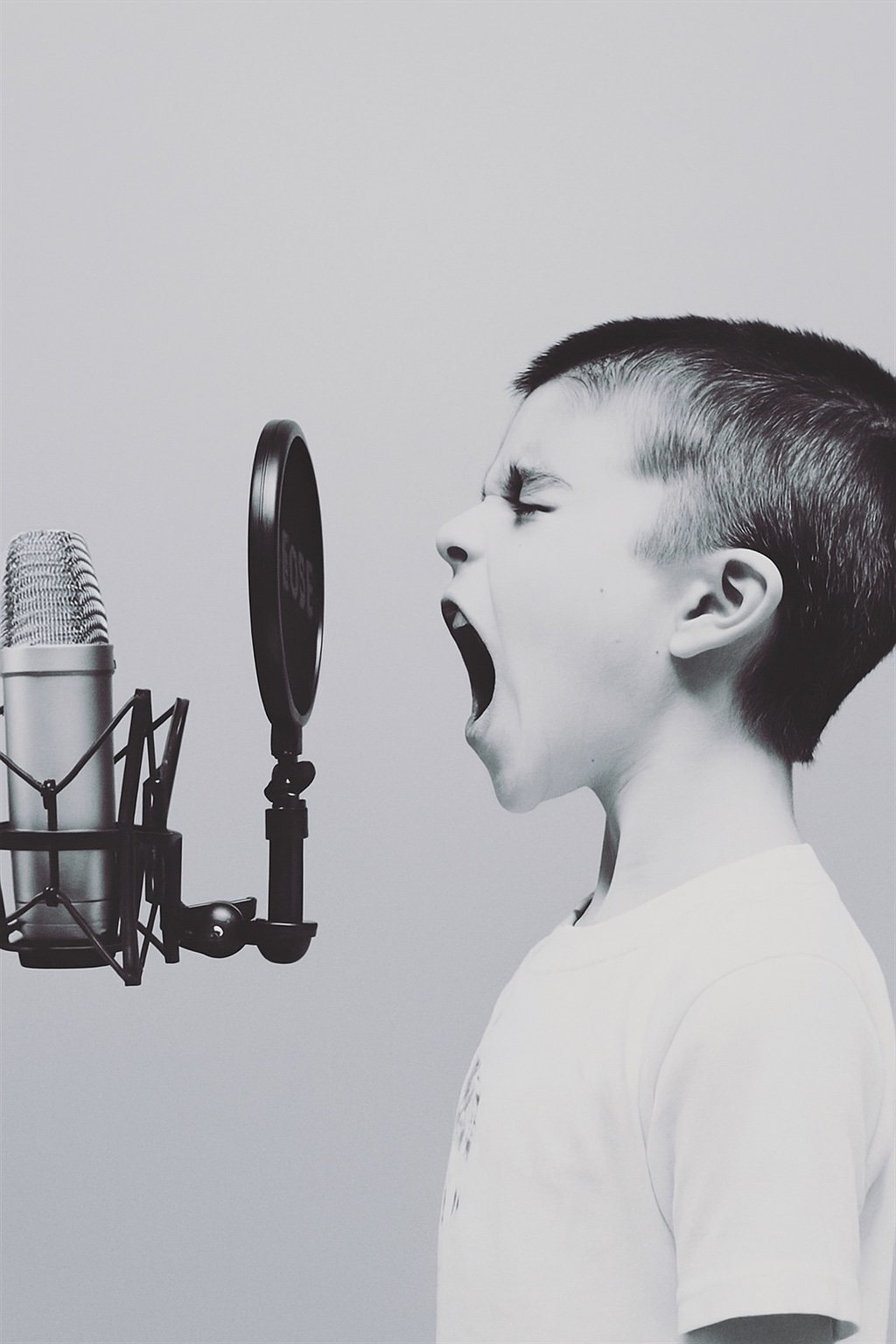 Young person with microphone